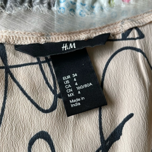 H & M rose top with feathering at neck and sleeves. - Picture 3 of 4